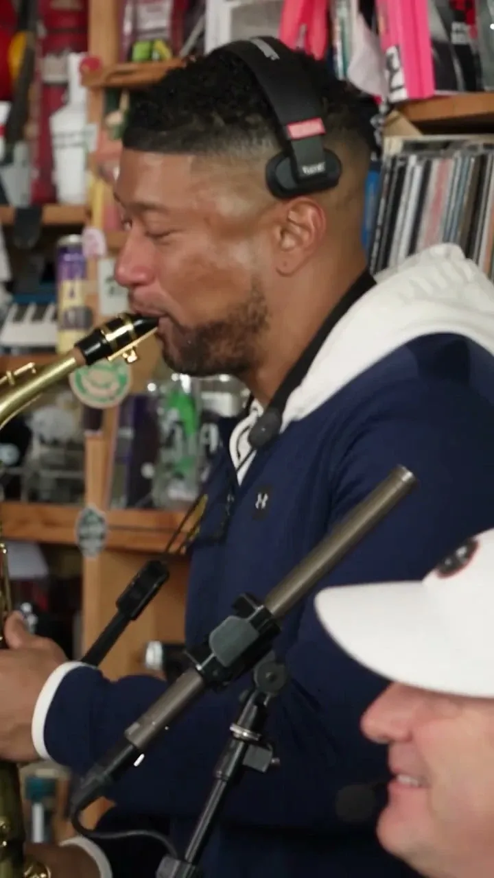 The saxophone soloist performing near the end of the set